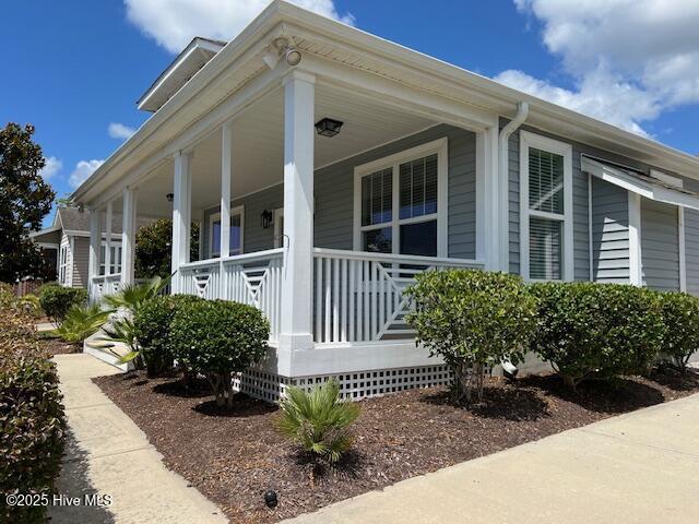 view of home's exterior with a porch