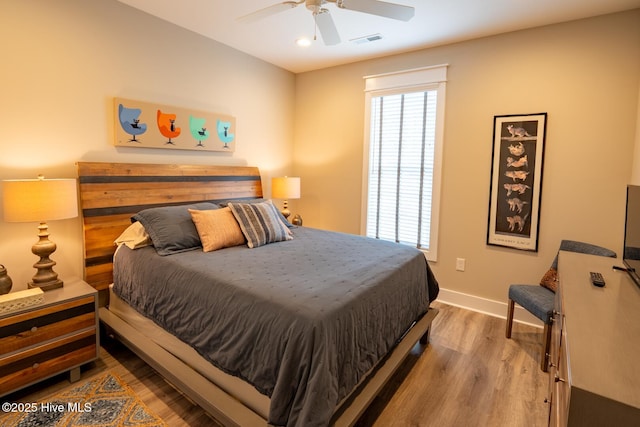 bedroom featuring baseboards, visible vents, ceiling fan, wood finished floors, and recessed lighting