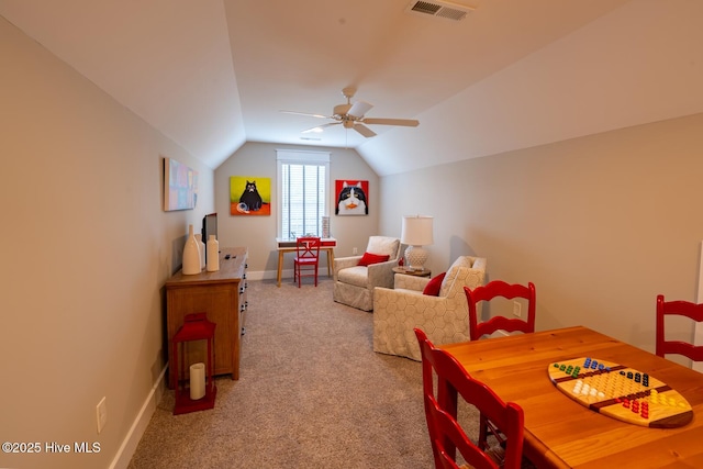 recreation room with light carpet, visible vents, baseboards, vaulted ceiling, and a ceiling fan