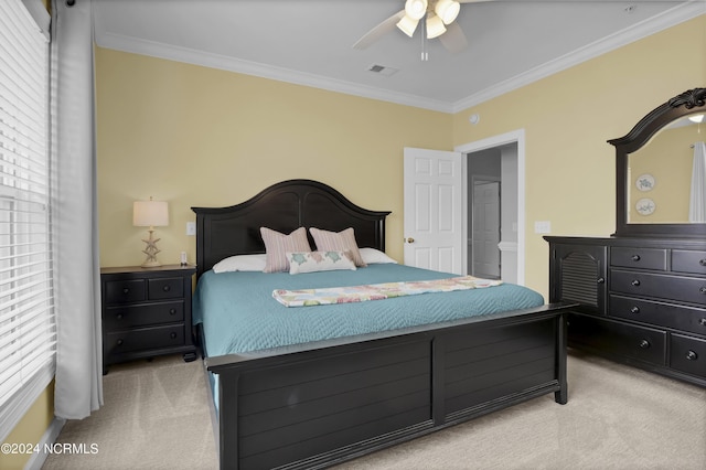 bedroom featuring carpet, multiple windows, visible vents, and ornamental molding