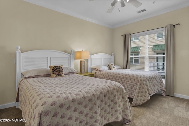 carpeted bedroom with ornamental molding, visible vents, ceiling fan, and baseboards