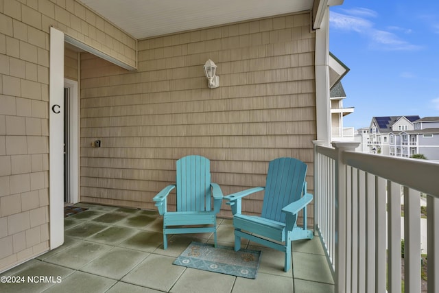 balcony featuring a residential view