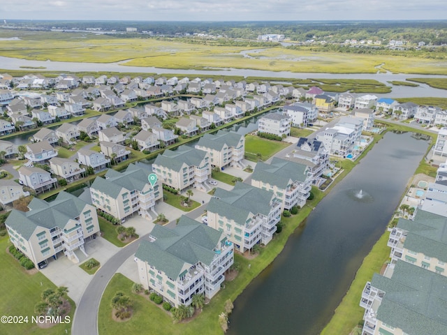 aerial view with a water view and a residential view