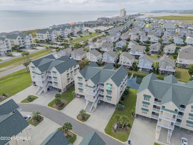 bird's eye view with a water view and a residential view