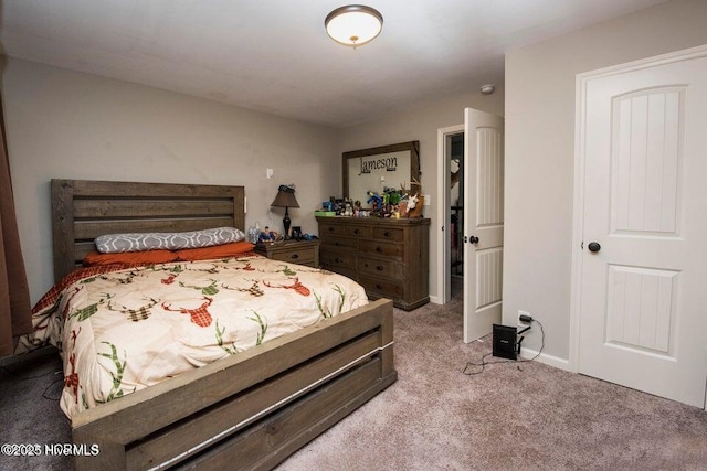 carpeted bedroom with baseboards