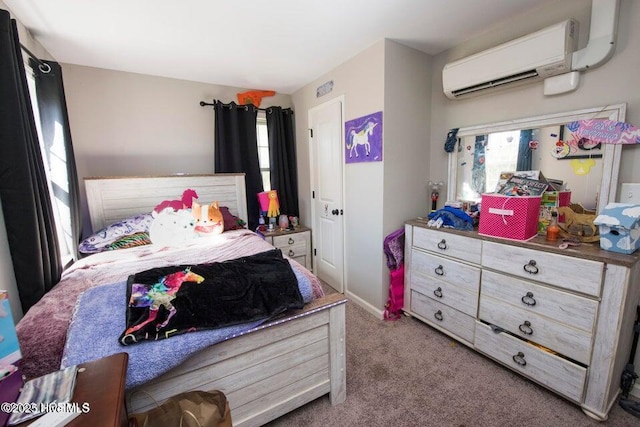 carpeted bedroom with a wall unit AC