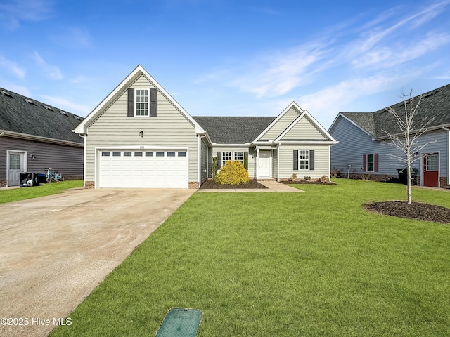 view of front of property featuring a garage, driveway, roof with shingles, and a front yard