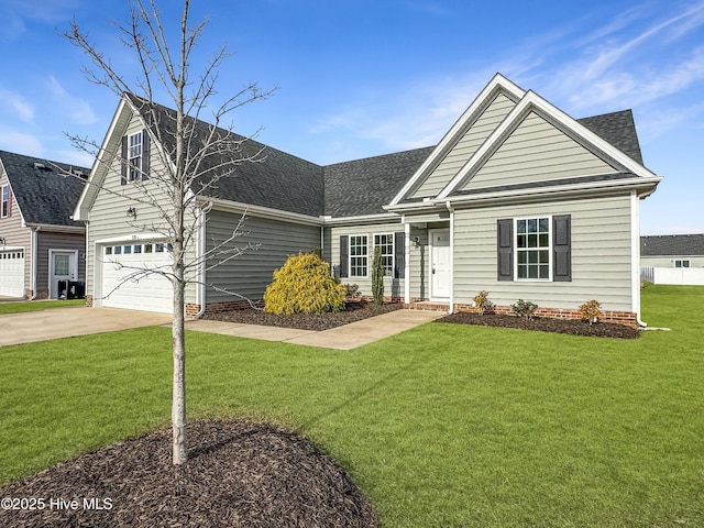 view of front facade with a garage, a front yard, concrete driveway, and a shingled roof