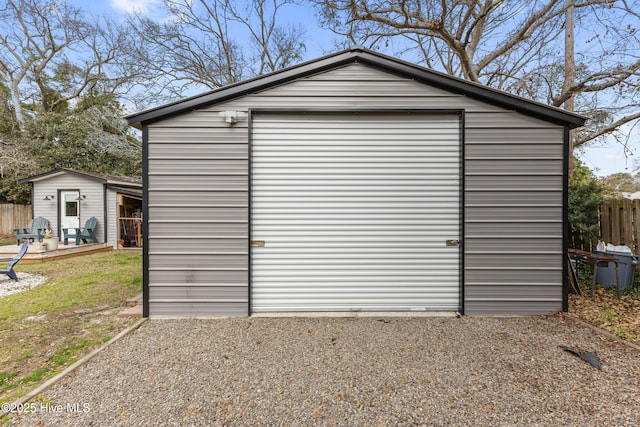 view of outdoor structure with an outdoor structure and fence