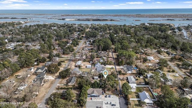 bird's eye view featuring a residential view and a water view