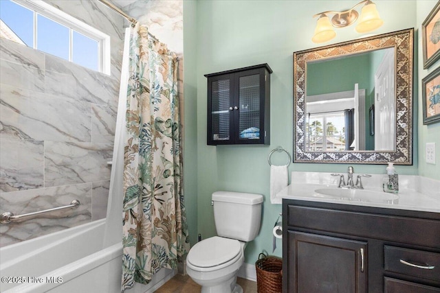 bathroom featuring vanity, toilet, and shower / bathtub combination with curtain