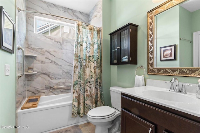 bathroom featuring toilet, shower / bath combo with shower curtain, and vanity