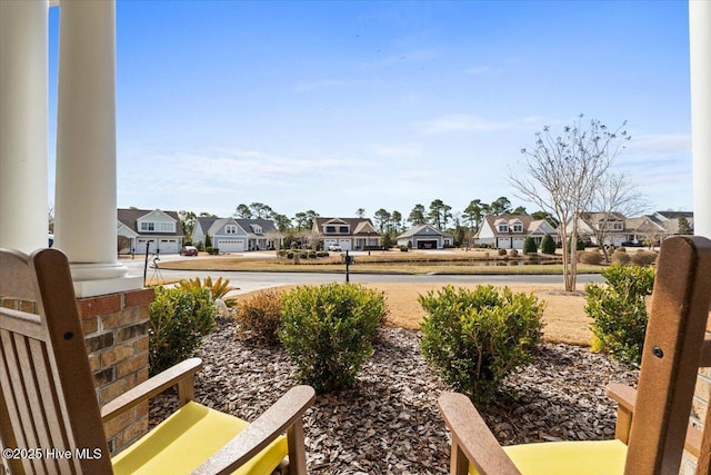 view of yard with a residential view