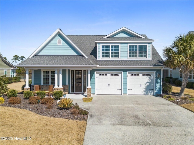 view of front facade with driveway, a shingled roof, a garage, and a porch