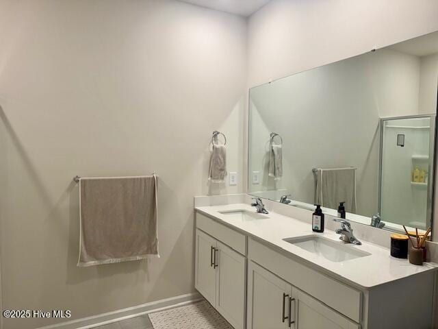 full bath featuring a sink and double vanity