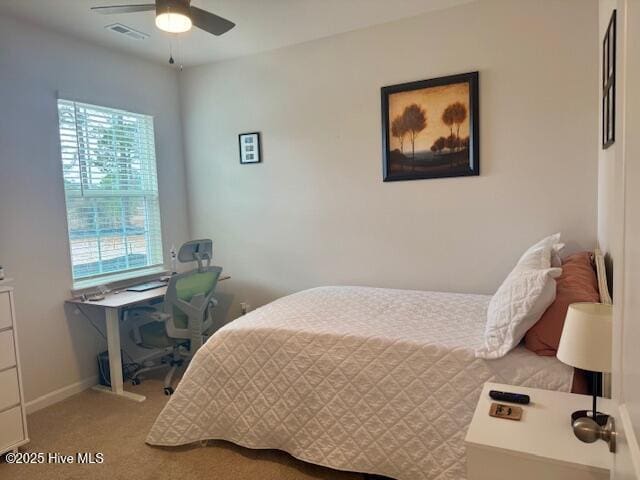 bedroom featuring baseboards, visible vents, ceiling fan, and carpet flooring