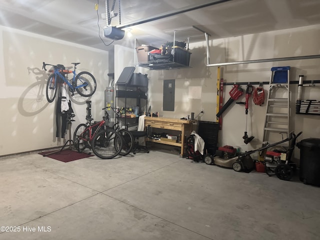 garage featuring strapped water heater, electric panel, and a garage door opener