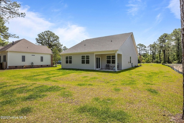 1507 Caracara Dr, New Bern, NC 28560 - rear view of property featuring a patio, a lawn, and crawl space