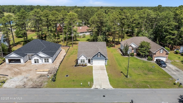 1507 Caracara Dr, New Bern, NC 28560 - view from above of property with a heavily wooded area
