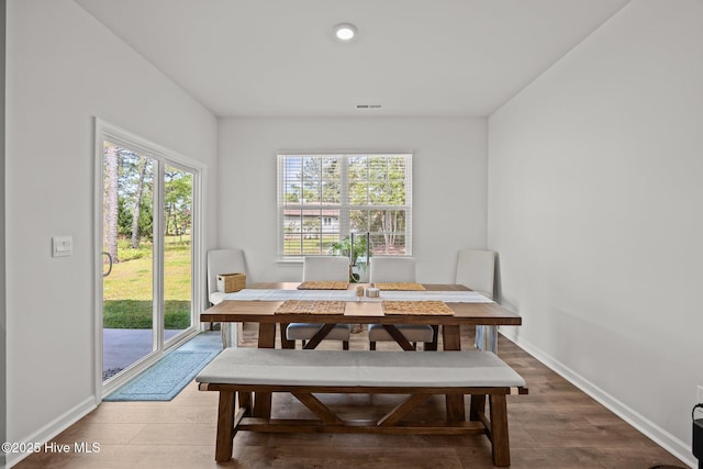 1507 Caracara Dr, New Bern, NC 28560 - dining space featuring wood finished floors and baseboards