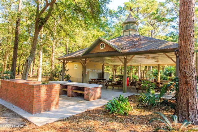 2906 Legends Dr, Southport, NC 28461 - view of patio featuring ceiling fan