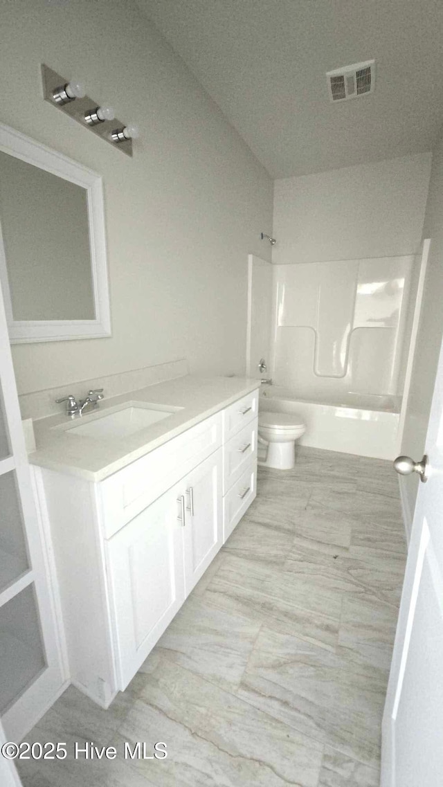 full bathroom featuring toilet, shower / bathtub combination, visible vents, and vanity