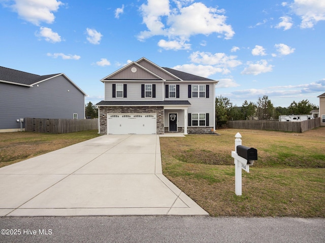 traditional-style house featuring fence, a garage, stone siding, driveway, and a front lawn