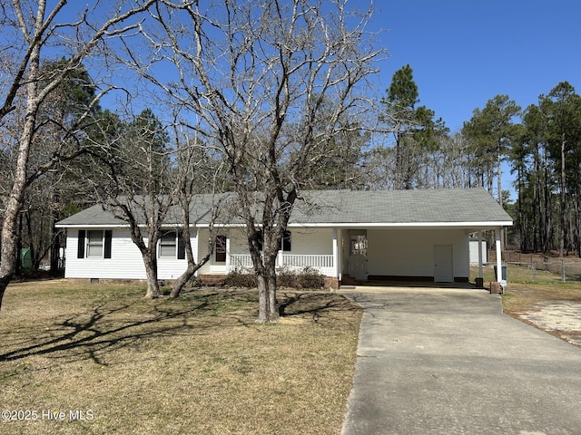 single story home with concrete driveway, a carport, a front yard, and crawl space