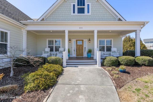 doorway to property with covered porch