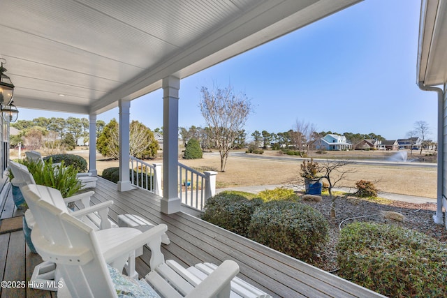 wooden terrace with covered porch