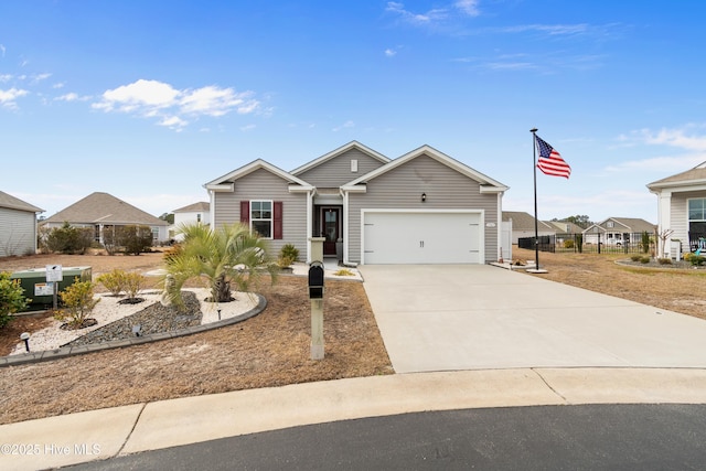 single story home featuring a garage and concrete driveway