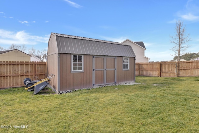 view of shed featuring a fenced backyard