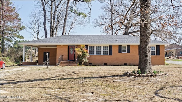 view of front facade with crawl space, entry steps, roof with shingles, and a carport