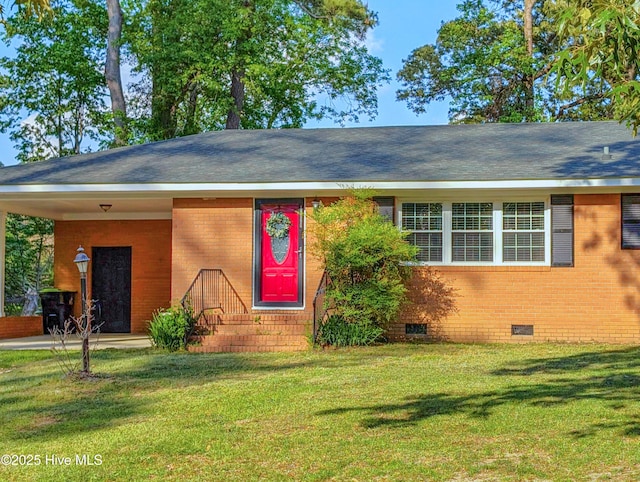 13596 Hobbton Hwy, Newton Grove, NC 28366 - ranch-style house with crawl space, a front yard, an attached carport, and brick siding