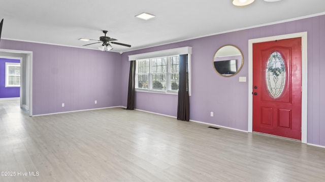 13596 Hobbton Hwy, Newton Grove, NC 28366 - entrance foyer with baseboards, crown molding, wood finished floors, and a ceiling fan