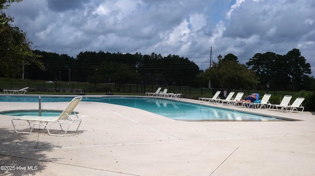 280 Woodlands Way Unit 1, Calabash, NC 28467 - community pool with fence and a patio area