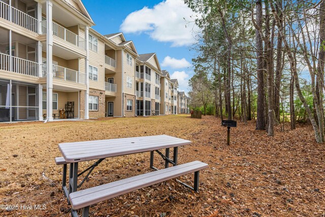 280 Woodlands Way Unit 1, Calabash, NC 28467 - view of home's community featuring a residential view