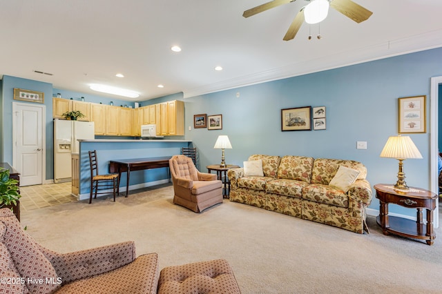 living room featuring recessed lighting, light carpet, crown molding, and visible vents