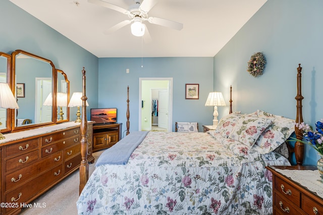 bedroom featuring ceiling fan and light colored carpet