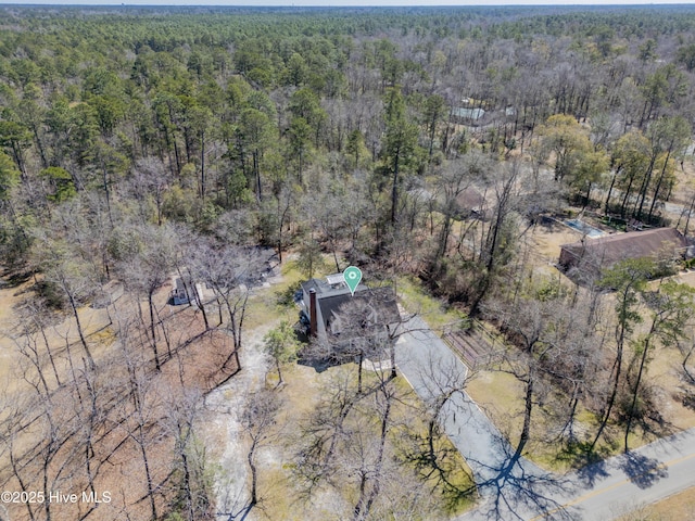 drone / aerial view with a forest view