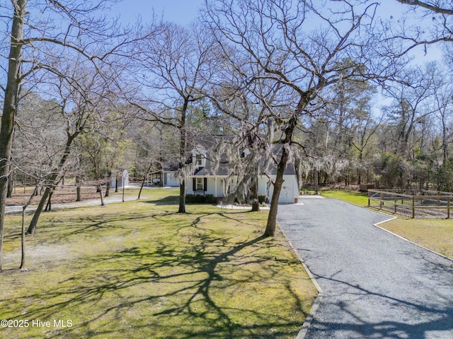 view of road with aphalt driveway