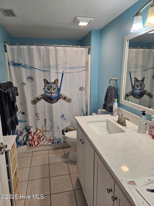 full bathroom featuring toilet, tile patterned flooring, vanity, and visible vents