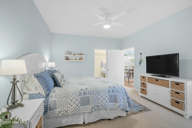 bedroom featuring ceiling fan and light colored carpet