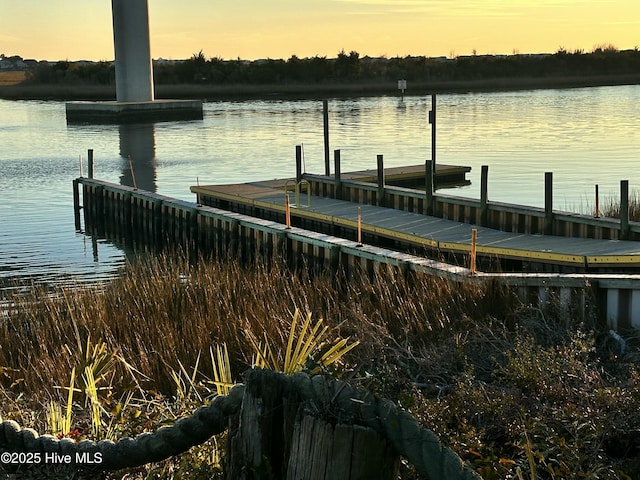 view of dock with a water view