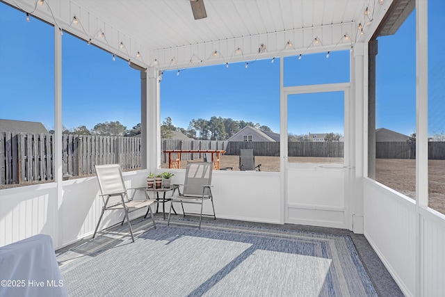 unfurnished sunroom with a healthy amount of sunlight