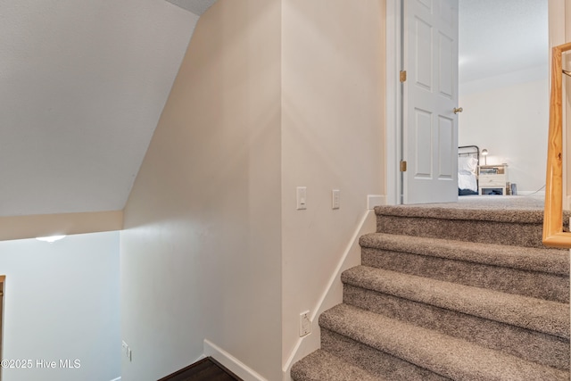 stairway with baseboards