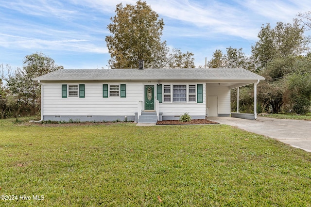 ranch-style house with an attached carport, a shingled roof, driveway, crawl space, and a front yard