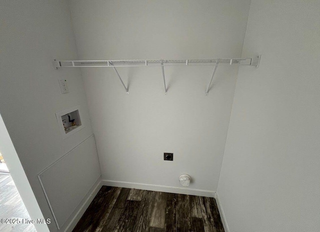 clothes washing area featuring laundry area, baseboards, dark wood-style floors, hookup for a washing machine, and hookup for an electric dryer