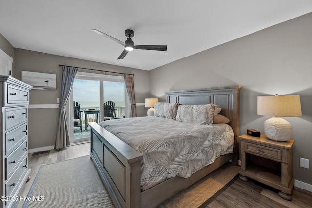 bedroom with baseboards, access to outside, a ceiling fan, and light wood-style floors