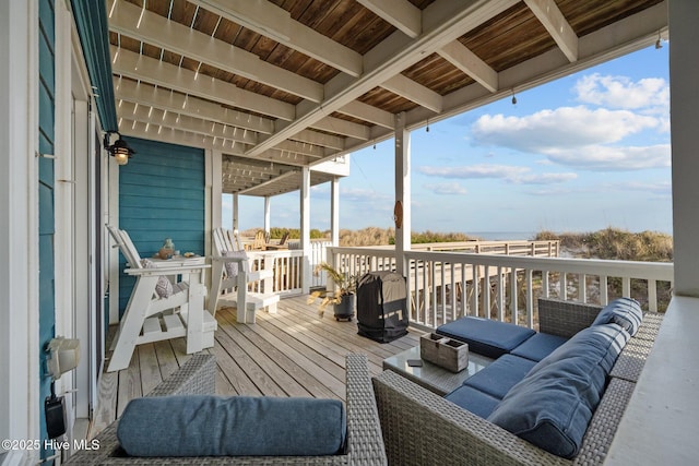 wooden deck featuring an outdoor living space